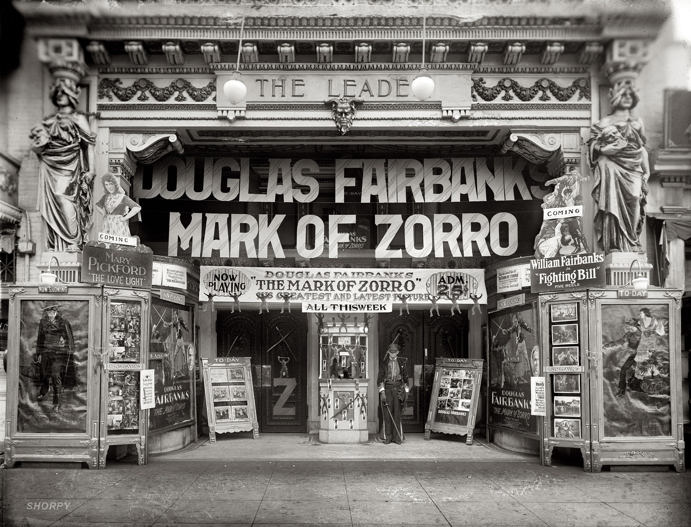 1921. Sidney Lust's Leader Theater in Washington, D.C. Now playing: Douglas Fairbanks in "The Mark of Zorro." National Photo glass negative. View full size.