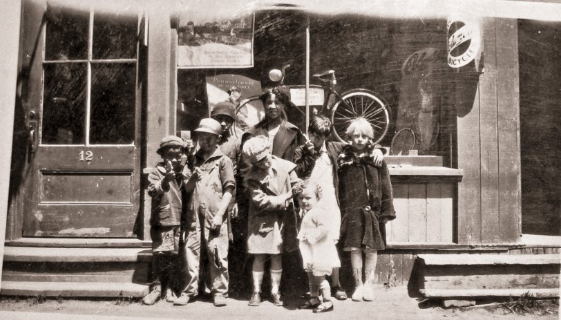 Unknown date, likely around 1920s. Group of kids in front of a bike shop, I'm thinking in Rockland Maine. My wife got several photos from a relative, this picture was included, so I am assuming they are a few relatives of hers here. View full size.
