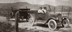 This came from my grandparents' photos, most likely taken in Yakima Valley Washington. Not sure who it is. The lc plate is 1921. The cars are Ford "T"s.
(ShorpyBlog, Member Gallery)