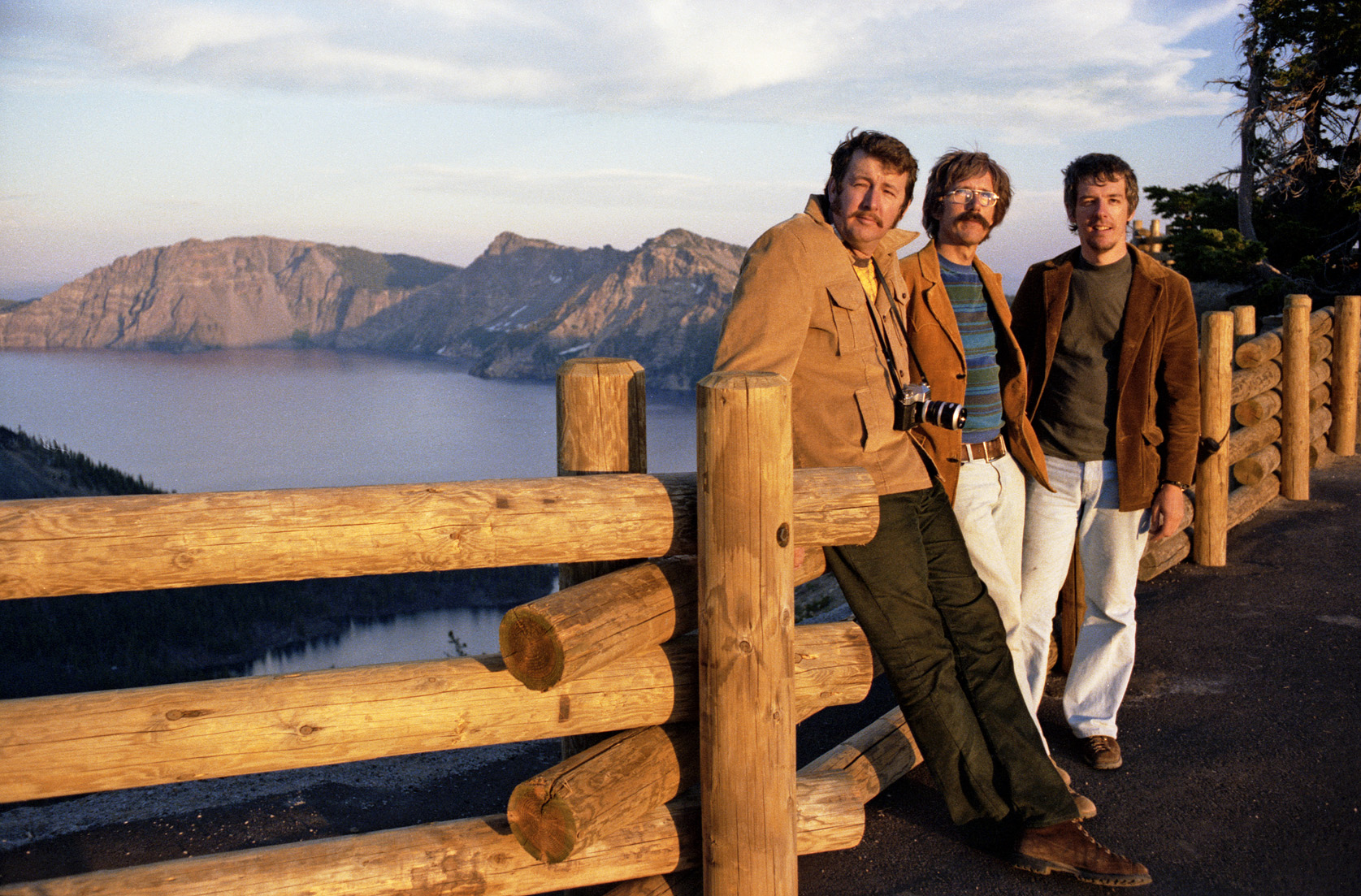 1975, Crater Lake, Oregon. A friend, my brother and me, captured during the golden hour. I shot this on 35mm Kodak Vericolor via self-timer. Lighting is everything, isn't it? View full size.