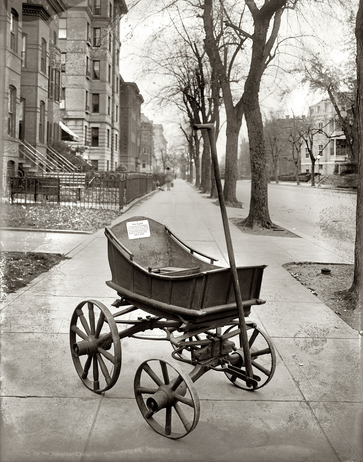 Washington, D.C. "Baby carriage. November 3, 1921." The inscription: "This wagon was made by Issacher Hughes in Richmond, Va., in 1808 for his first-born son. Has been used by six generations. Presented to the Association of Oldest Inhabitants, District of Columbia, Nov. 2, 1921, by his grandson, James W. Hughes." View full size. National Photo Company Collection glass negative.