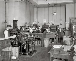January 1922. Washington, D.C. "Machinists' Association, printers." Another peek behind the scenes at the International Association of Machinists. View full size.
I likeexposed moving parts. Probably why I don't have a lot of sympathy for computers with, in some cases, almost no moving parts, exposed or not.
Business Is BusinessThey have a time clock!
Printing OfficeThe press shown here is a Kelly B made and sold by the American Type Founders. The machine is a high speed automatic cylinder letterpress.
(The Gallery, D.C., Natl Photo)