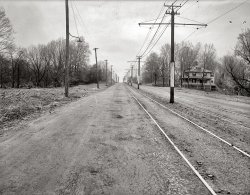 Washington, D.C. "Trolley line on Connecticut Avenue north from Grant Road." 1921 or 1922. View full size. National Photo Company Collection glass negative.
I lovethat house! I want a porch just like that! Even if it is a bit close to the road.
TrolleyThe trees look about the same, but the tracks and house are gone, as well as the intersection with Grant Road. Nearest cross street - Chesapeake St NW. 
(The Gallery, D.C., Natl Photo, Railroads)