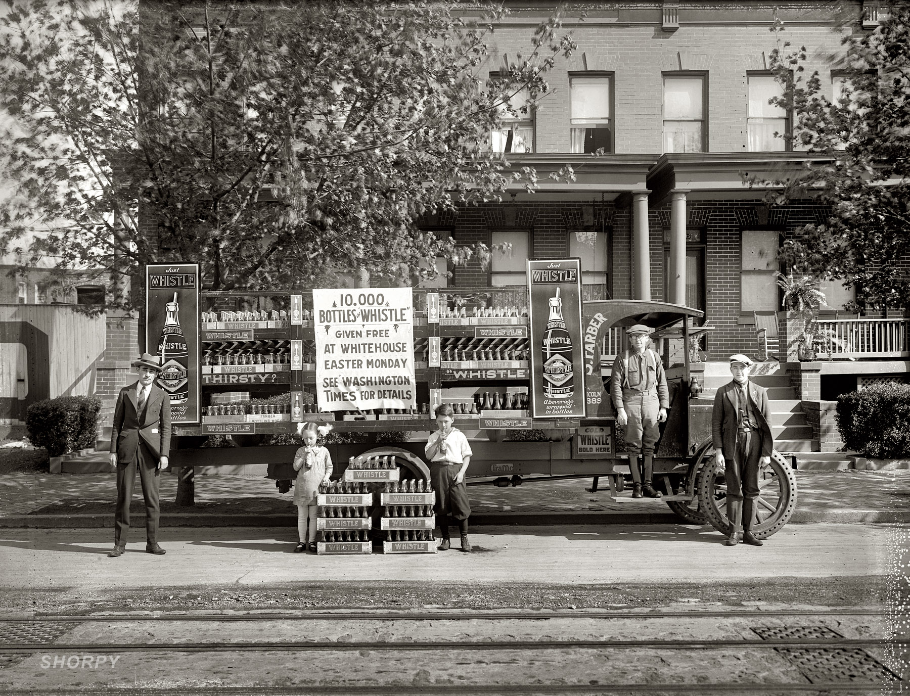 Washington, D.C., 1921. "Whistle car." A truck filled with Whistle, the "beverage wrapped in bottles." National Photo Company glass negative. View full size.