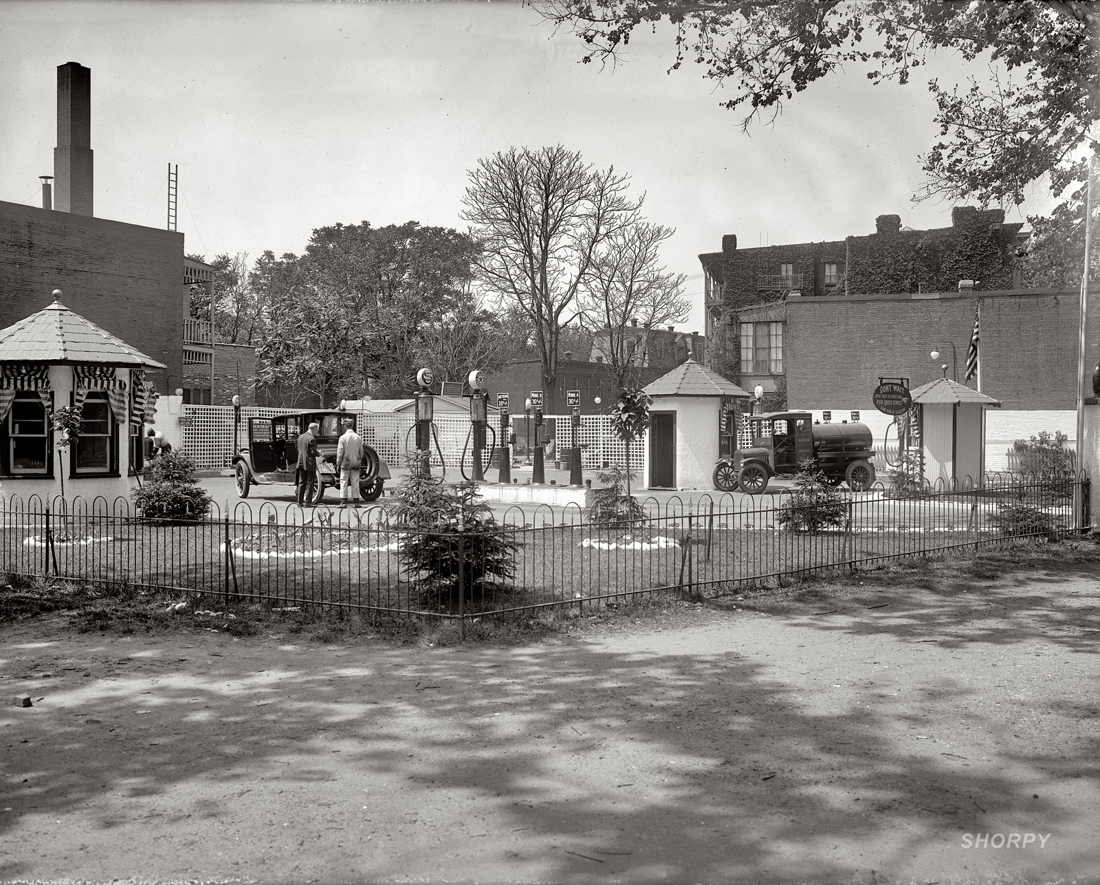 "Service station, First Street and Maryland Avenue." Spectacularly detailed view of the Capital Gasoline Station in Washington, D.C., in 1922. View full size. National Photo Company Collection glass negative. View even larger.