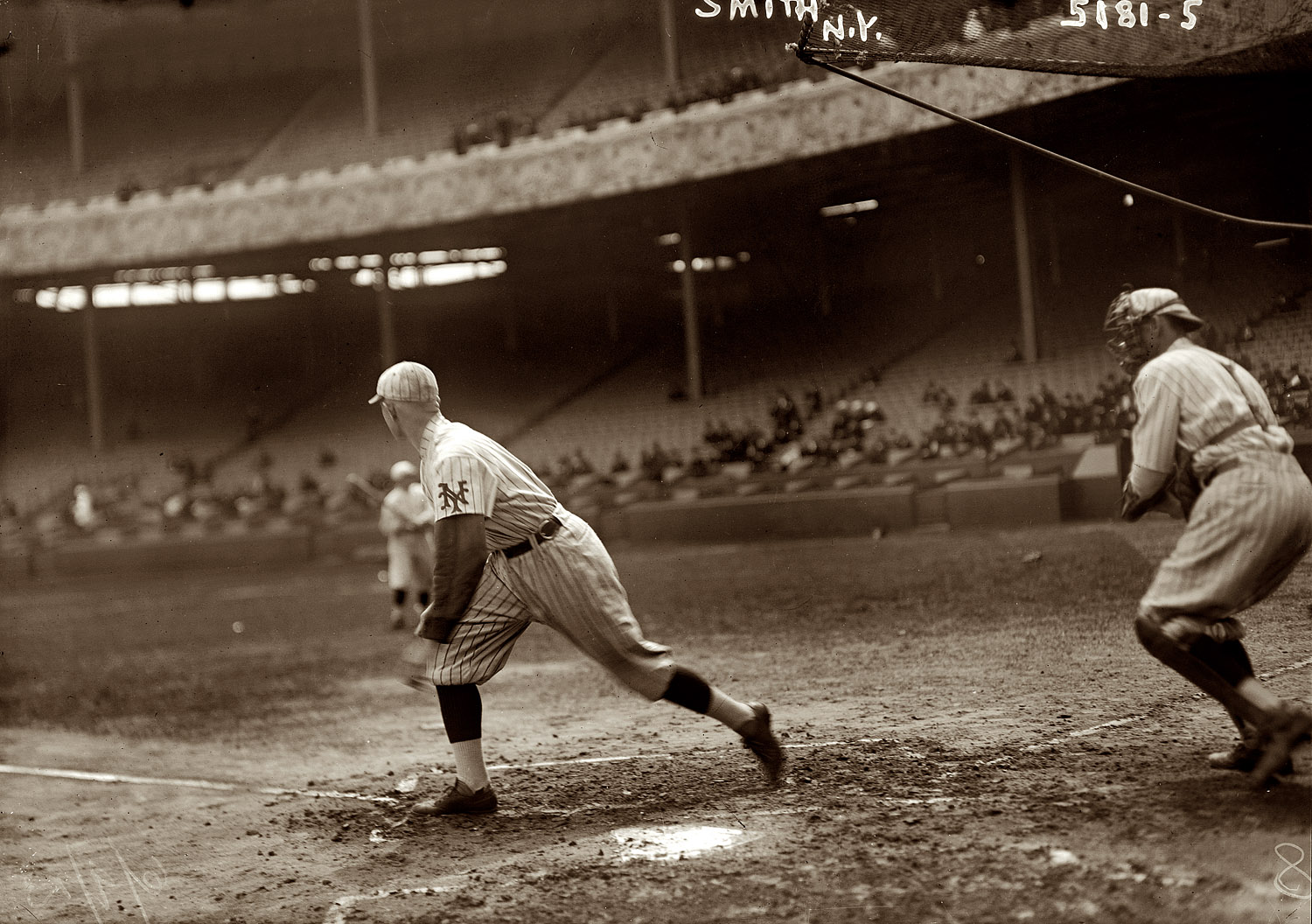 Earl Smith, New York National League (Giants). Date written on this glass-plate negative is June 9, 1923. Although another from this 5181 series of pictures taken at the Polo Grounds has "5/13/20" scratched into the emulsion. View full size. 5x7 glass negative, George Grantham Bain Collection.