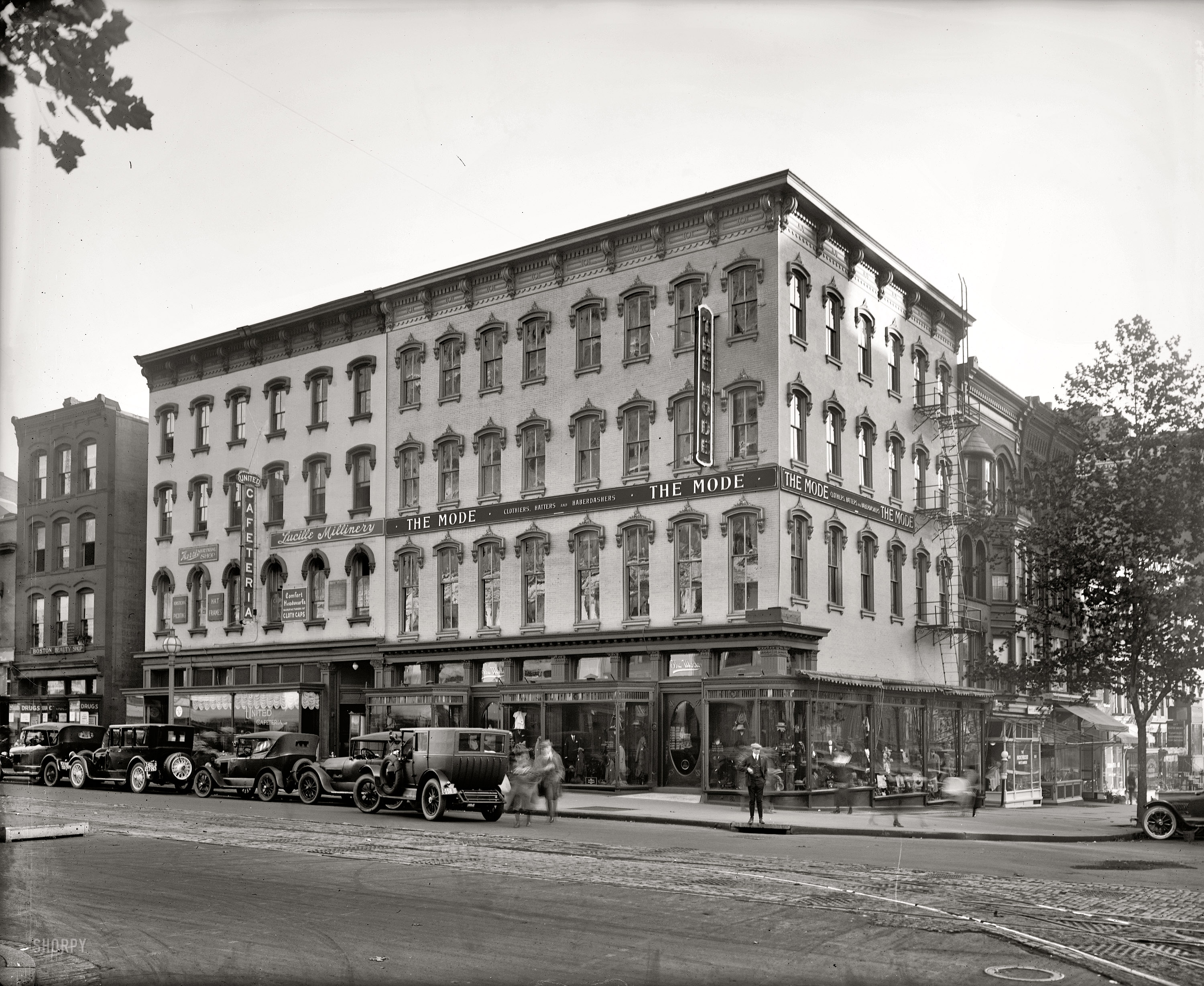 Circa 1919, another Washington streetscape. "The Mode, 11th and F Streets." National Photo Company Collection glass negative. View full size.