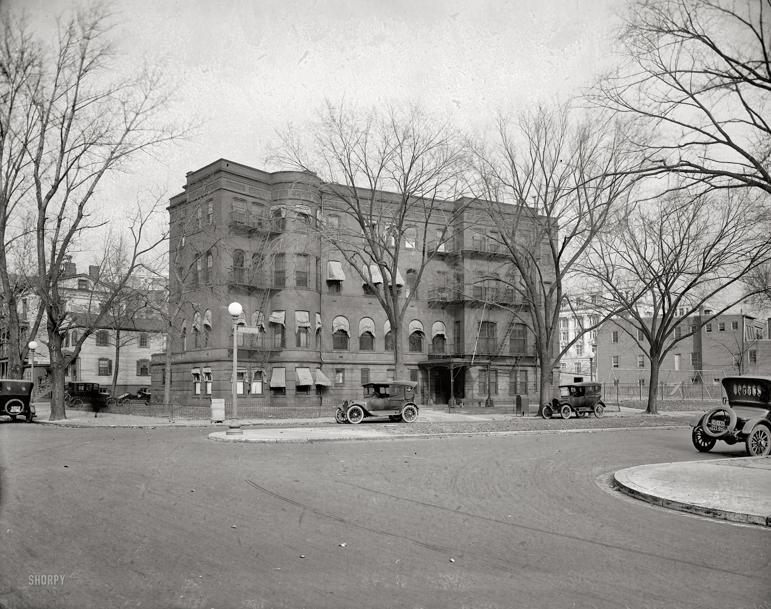 Washington, D.C., circa 1922. "House of Detention, Ohio Avenue N.W." Equipped with a nice playground. National Photo Company glass negative. View full size.