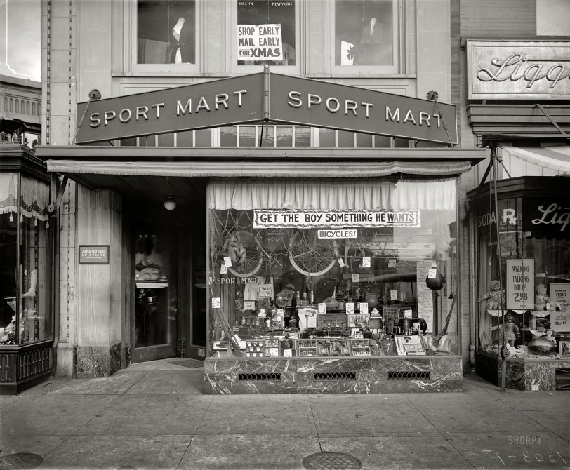 Washington, D.C., circa 1922. "Sport Mart, 1303 F Street N.W." Shorpy would like one of each, please. National Photo Company glass negative. View full size. Update: For the window-shoppers among us, I've posted a bigger closeup here.
