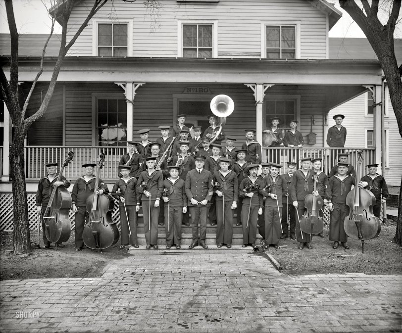 Washington, D.C., circa 1923. "Navy Yard Band." Brass, woodwinds and a surfeit of strings. National Photo Company Collection glass negative. View full size.
