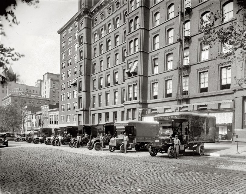 Washington, D.C., 1923. "W.B. Moses &amp; Sons, F and 11th Sts." Note the unusual circular windows at the top of the building. National Photo Co. View full size.
