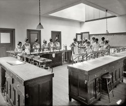 Washington, D.C., circa 1925. "Howard University classroom." On the blackboard: egg recipes. National Photo Co. glass negative. View full size.