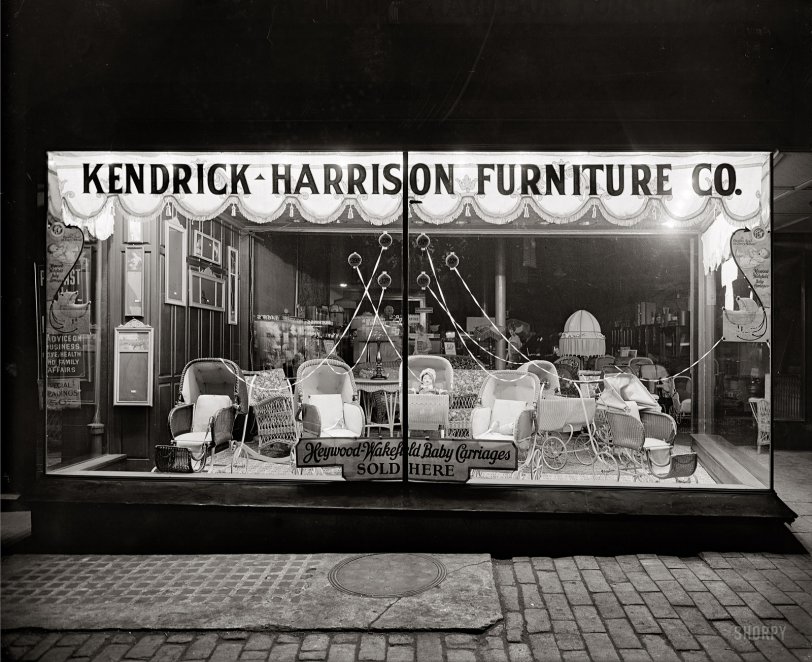 Washington, D.C. "Kendrick-Harrison Furniture Co. window." Next door to this slightly spooky circa 1922 display of Heywood-Wakefield baby carriages is a palm reader. National Photo Company Collection glass negative. View full size.
