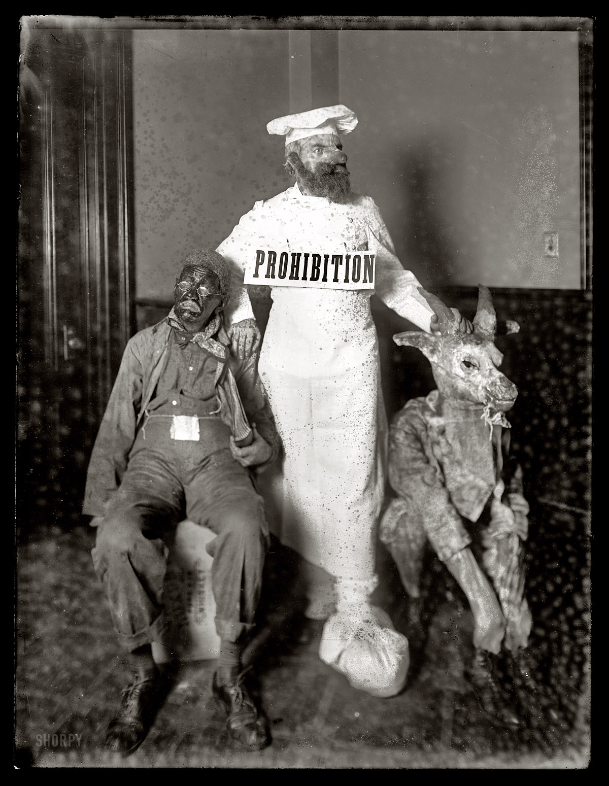 Washington, D.C., circa 1916. There's no caption for this one so we'll have to improvise: "Allegory of Prohibition with cook, goat and ledger-toting old-timer in blackface." National Photo Co. Collection glass negative. View full size.