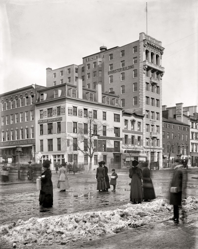 From now until February we'll be doing hourly updates from the ShorpyCam at Seventh and F. National Photo Company glass negative. View full size.
