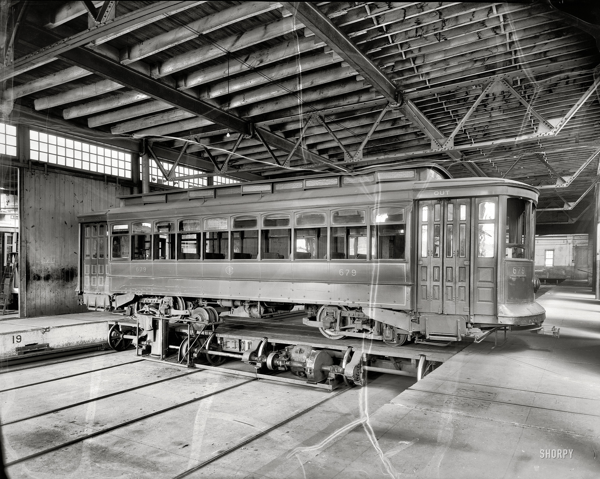 Washington, D.C., circa 1932. "Capital Traction Company trolley in car barn." 8x10 safety negative, National Photo Company Collection. View full size.