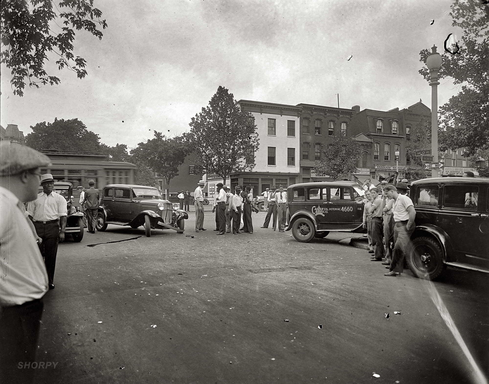 "Street scene, auto accident, 14th and Q." A second look at this Washington, D.C., car crash circa 1932. National Photo Co. safety film negative. View full size.