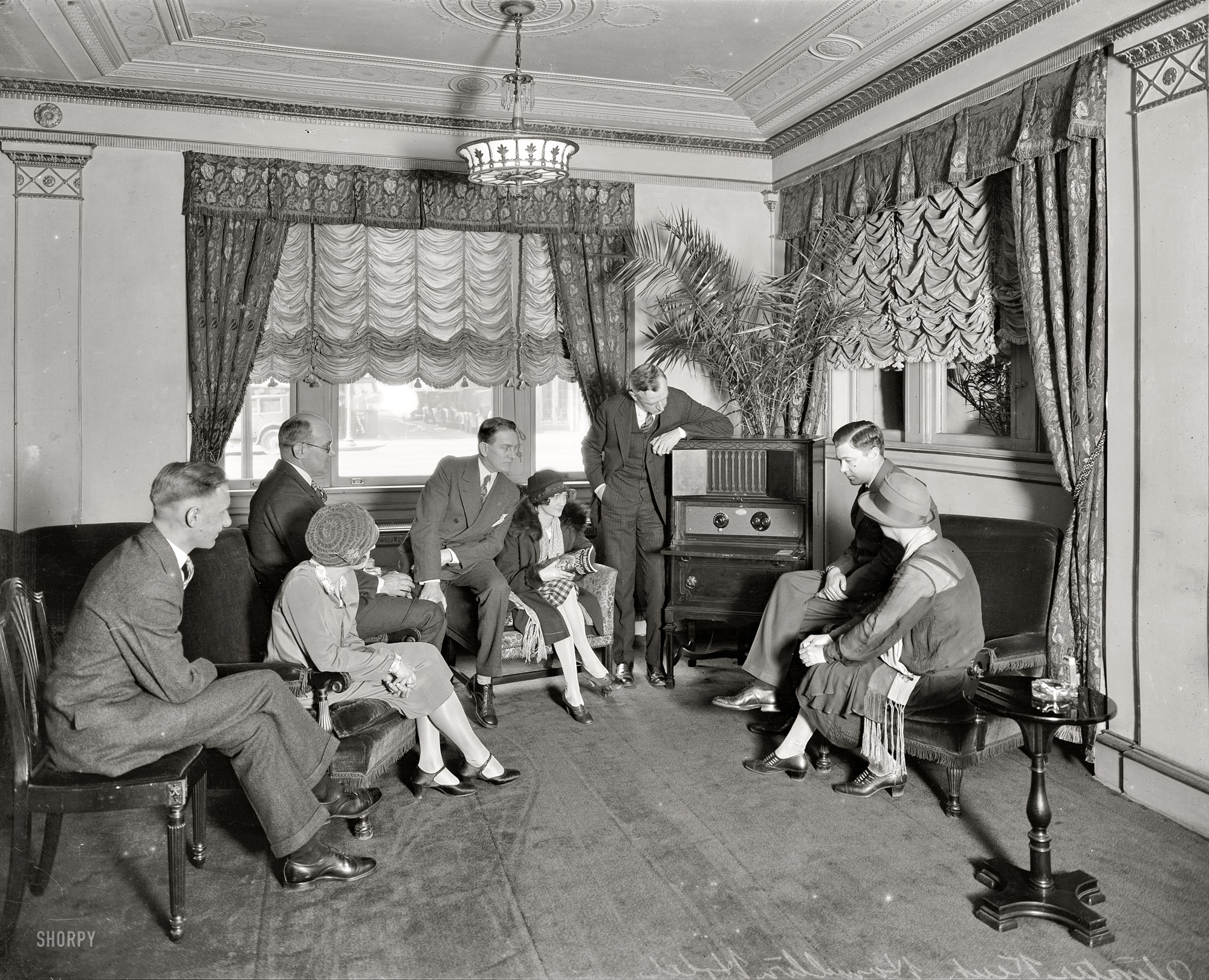 Washington, D.C., circa 1927. "Thomas R. Shipp group, Hamilton Hotel. Atwater Kent standing by radio." National Photo Co. safety negative. View full size.