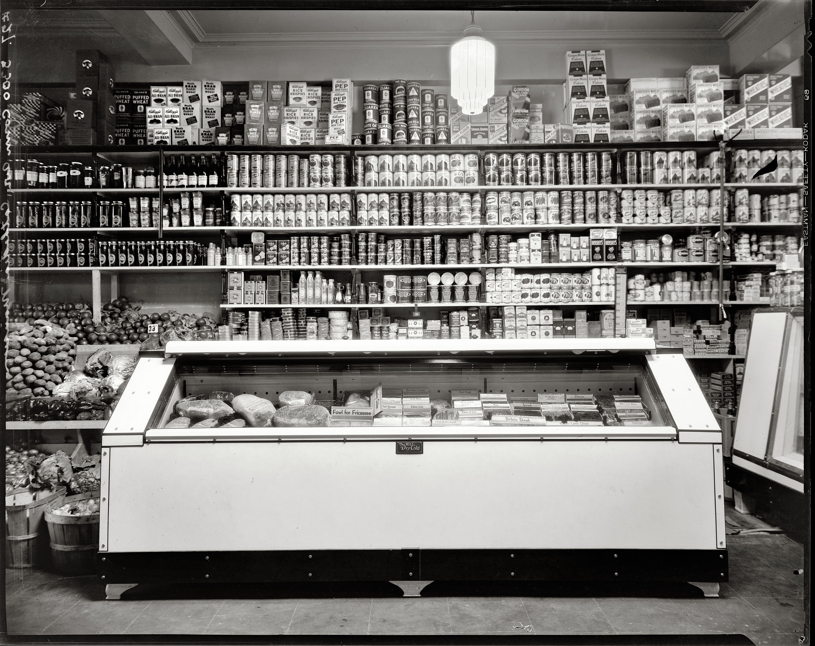 Washington, D.C., circa 1935. "Interior of D.G.S. Store, 3300 Connecticut Avenue, Cathedral Mansions." An interesting look at some Birdseye Packing Co. "Frosted Foods." View full size. 8x10 safety negative, National Photo Co. Note that by 1935, National Photo has made the jump from glass to film as a recording medium. Resulting in a more modern, contrastier look but a little less detail.