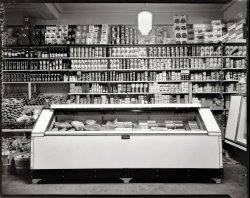 Washington, D.C., circa 1935. "Interior of D.G.S. Store, 3300 Connecticut Avenue, Cathedral Mansions." An interesting look at some Birdseye Packing Co. "Frosted Foods." View full size. 8x10 safety negative, National Photo Co. Note that by 1935, National Photo has made the jump from glass to film as a recording medium. Resulting in a more modern, contrastier look but a little less detail.
BrandedSo many products and brand names that many of us early baby boomers long thought were post-WW2 creations made just in time for us!
Heinz 57 BreakfastI wonder how long Heinz stayed in the breakfast wheat and rice flake business. 
District Grocery Store Washington Post, May 1, 1936

 D.G.S. Celebrates 15th Anniversary
District Grocery Stores, Inc., is celebrating the fifteenth anniversary of its founding. The organization has grown into a co-operative with 265 member store spreading from Rockville, Md., on the north, to Manassas, Va., on the south, and from Riverdale, Md., on the east to Glen Echo Md., on the west.
Each District Grocery Store is operated by its owner.  Stores offer such free services as telephone shopping service, free delivery and credit extension whenever it is necessary.
The D.G.S. maintains a warehouse at Fourth and D streets southwest, where only members may purchase groceries, meats, fresh fruits and vegetables, eggs, dairy products, beverages, tobacco and candy.  Sales to members last year totaled more then $5,000,000.  Sales this year are expected to exceed $6,000.000.

(The Gallery, D.C., Natl Photo, Stores & Markets)