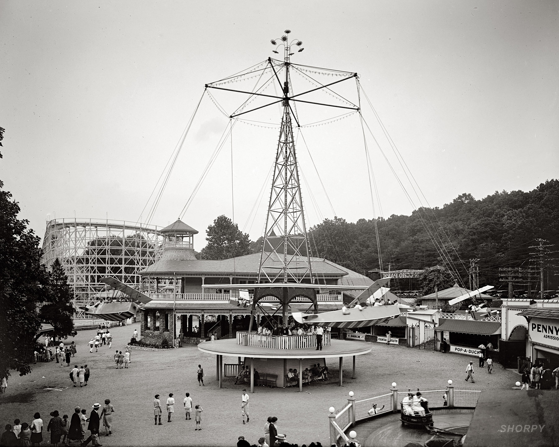 The "Aeroplane" ride at Glen Echo amusement park in Montgomery County, Maryland, circa 1928. View full size. National Photo Company glass negative.