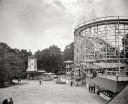 Roller coaster at the Glen Echo amusement park in Montgomery County, Maryland, circa 1928. View full size. National Photo Company glass negative.
Wood Roller CoastersThere are lots of wood coasters in operation today, and not just old ones still in operation.  New ones are being built and in many cases they are more popular than the steel ones.  IMHO, they are lots more fun, and the noise they make is a big part of it.
Cotton Candy CoutureCan you imagine going to an amusement park today in a dress and heels?? It seems ludicrous even for the 1920s, but then again, people then dressed up to cross the street.
Wood vs SteelI'm not sure why Sal is so worried about Coaster Dips being built of wood. For the record, the first steel roller coaster was The Matterhorn Bobsleds at Disneyland built in 1959. Among Roller Coaster enthusiasts there is considerable debate about the relative merits of wood vs. steel. There are thing you can only really do with steel (loops come to mind), but there is a definite feel too wood that can't be replicated by steel. Safety is not one of the issues.
1891--1968 Glen EchoThe Glen Echo Park began in 1891 as a National Chautauqua Assembly and then developed within a decade into a very popular amusement park as well as still its many other venues on the grounds such as the 1933 Spanish Ballroom. The facility was run until 1968, closed and the National Park Service bought the park in 1971 to be a nonprofit arts and culture partnership. I remember as a child going to the old Glen Echo and seeing this very roller-coaster! Here is a link to the present map of the park:
http://www.glenechopark.org/parkmap.pdf
What Goes UpAn amusement park near me still has a working 1920s wooden roller coaster.  While I can't see why any sane person would ever ride the thing (or any roller coaster---at least not twice), I find it fascinating as a historical item.
Wooden coastersThe coasters being constructed of wood was part of the whole experience.
Coaster DipsPlease tell me that thing is metal, not wood. I love the body language of the snappy foursome by the saltwater taffy stand. You can tell they are discussing what they're going to do.
Wood for meIn 1999 Busch Gardens in Tampa opened Gwazi, a wooden "dueling" roller coaster. Wooden coasters are the best!  This one, unfortunately, was torn down and burned in 1969, a year after the park closed.
Glen EchoGlen Echo has done a good job at preserving some of its history. Without knowing the history behind the park I visited last year because they have a very popular swing dance night in the ballroom. The Spanish Ballroom (which is seen in the map) is absolutely beautiful! People of all sorts come out on Saturday nights for swing dancing, I'm sure some of them were around when the park was active! Very cool.
(The Gallery, Natl Photo, Sports)