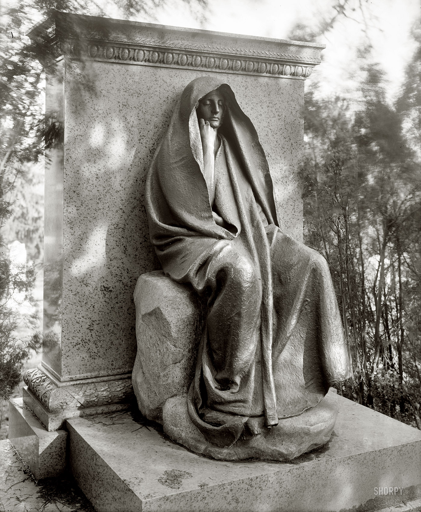 Washington, D.C., circa 1915. "Grief monument, Rock Creek cemetery." Augustus Saint-Gaudens's ambiguously enigmatic bronze memorializing Clover Adams, the society hostess whose suicide led to its commission by her husband, the writer Henry Adams. National Photo Co. Collection glass negative. View full size.
