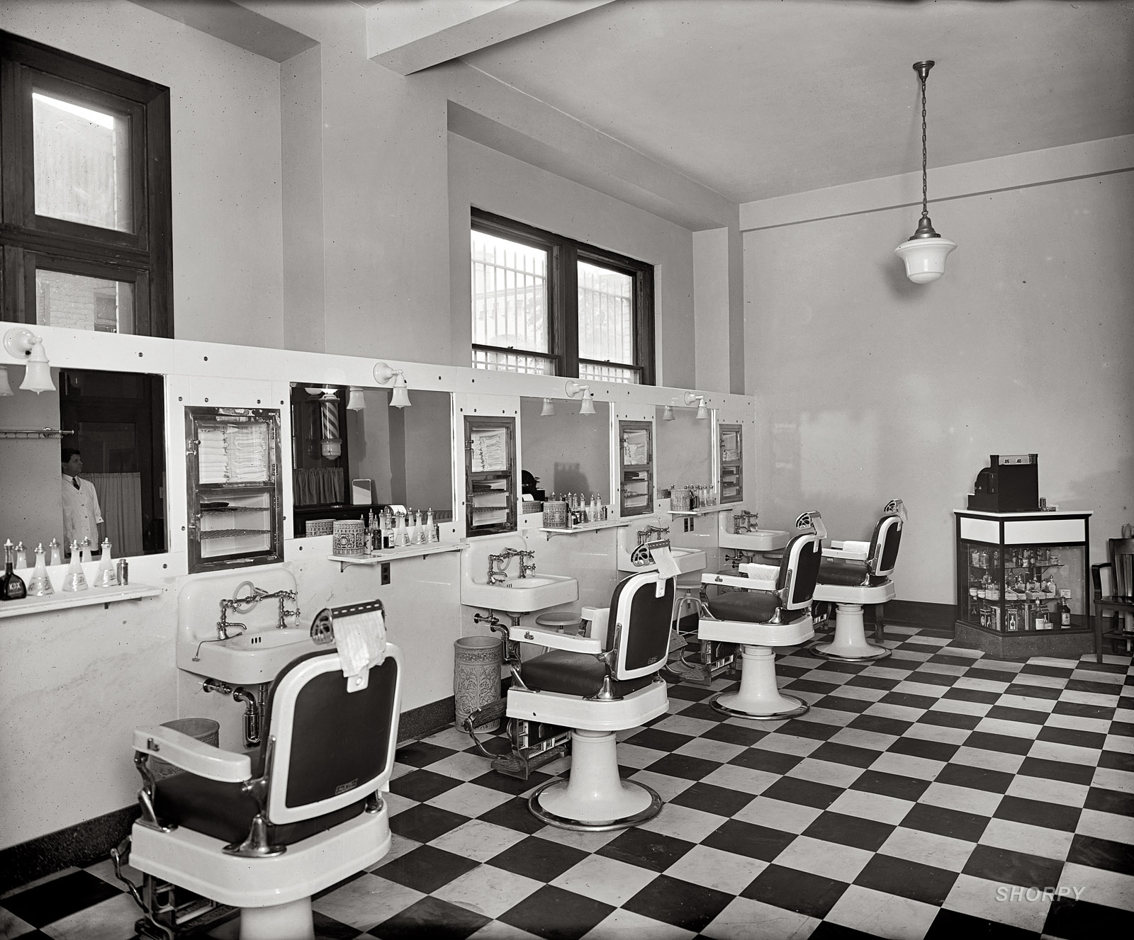 Washington, D.C., circa 1925. "Barbershop, Investment Building," 15th and K Streets N.W. National Photo Company Collection glass negative. View full size.