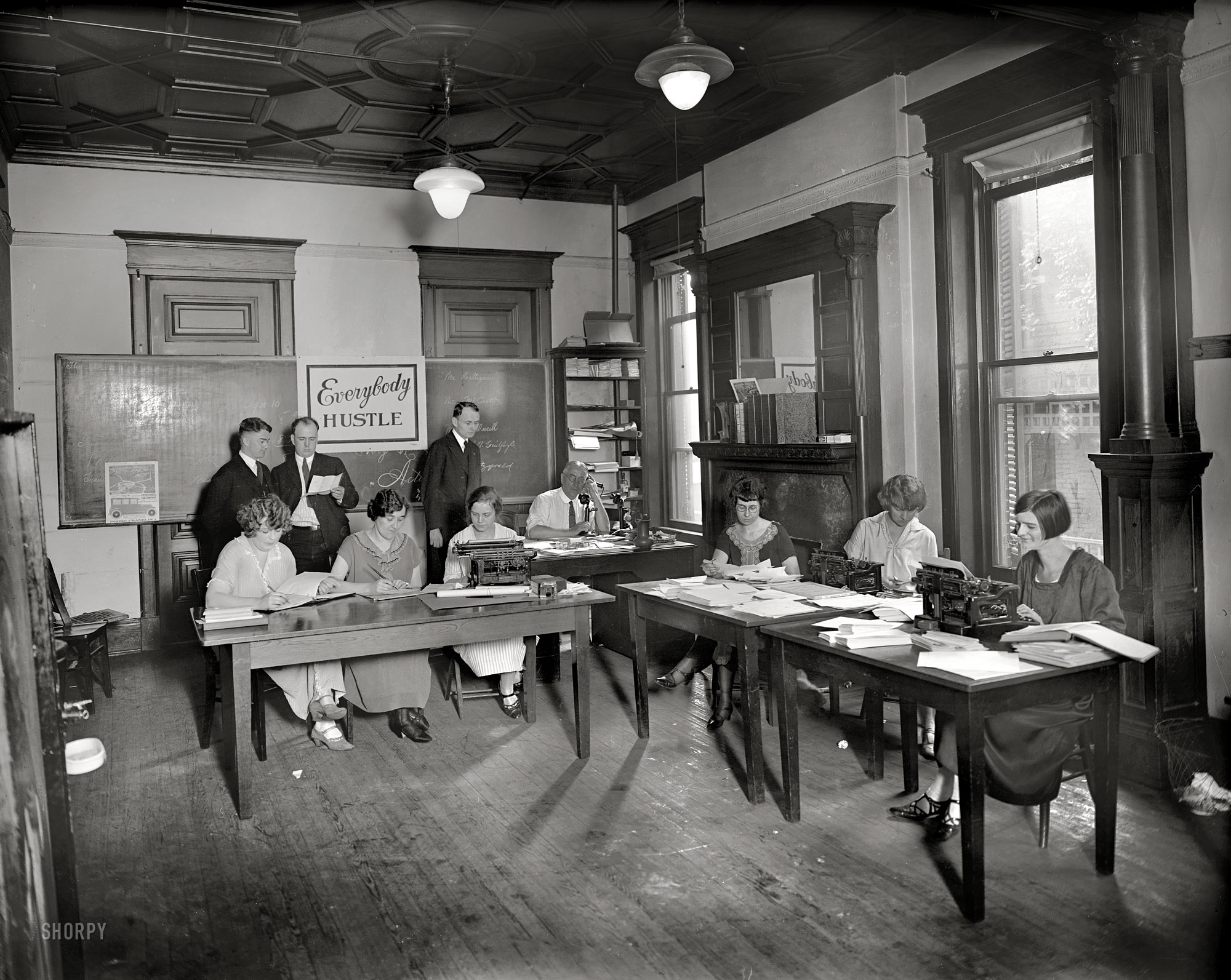 Washington, D.C., circa 1925. "Holy Name office group." An impressive array of Jazz Age office equipment and hairstyles. National Photo Co. View full size.
