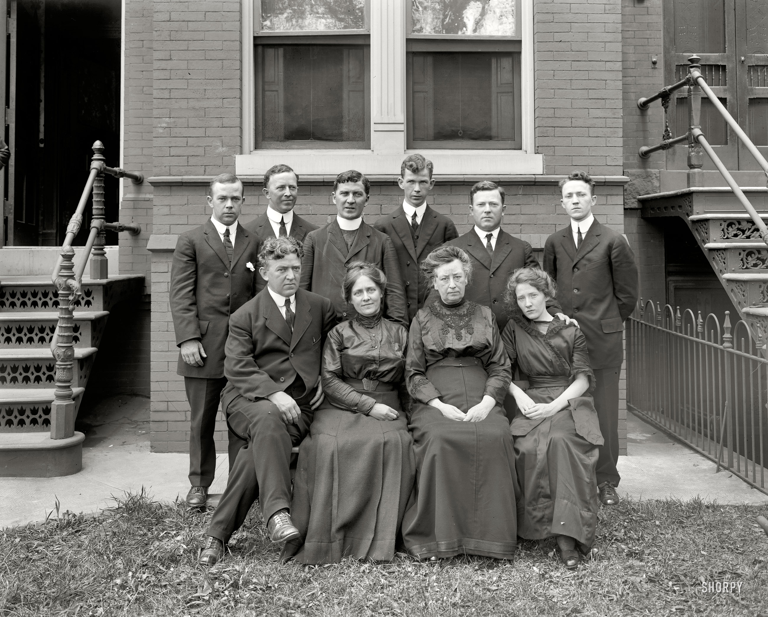 Washington, D.C., circa 1920. "Father Fealey and family." Ignatius Fealey, post chaplain at Fort Myer and future pastor of St. Agnes Catholic Church. National Photo Company Collection glass negative. View full size.