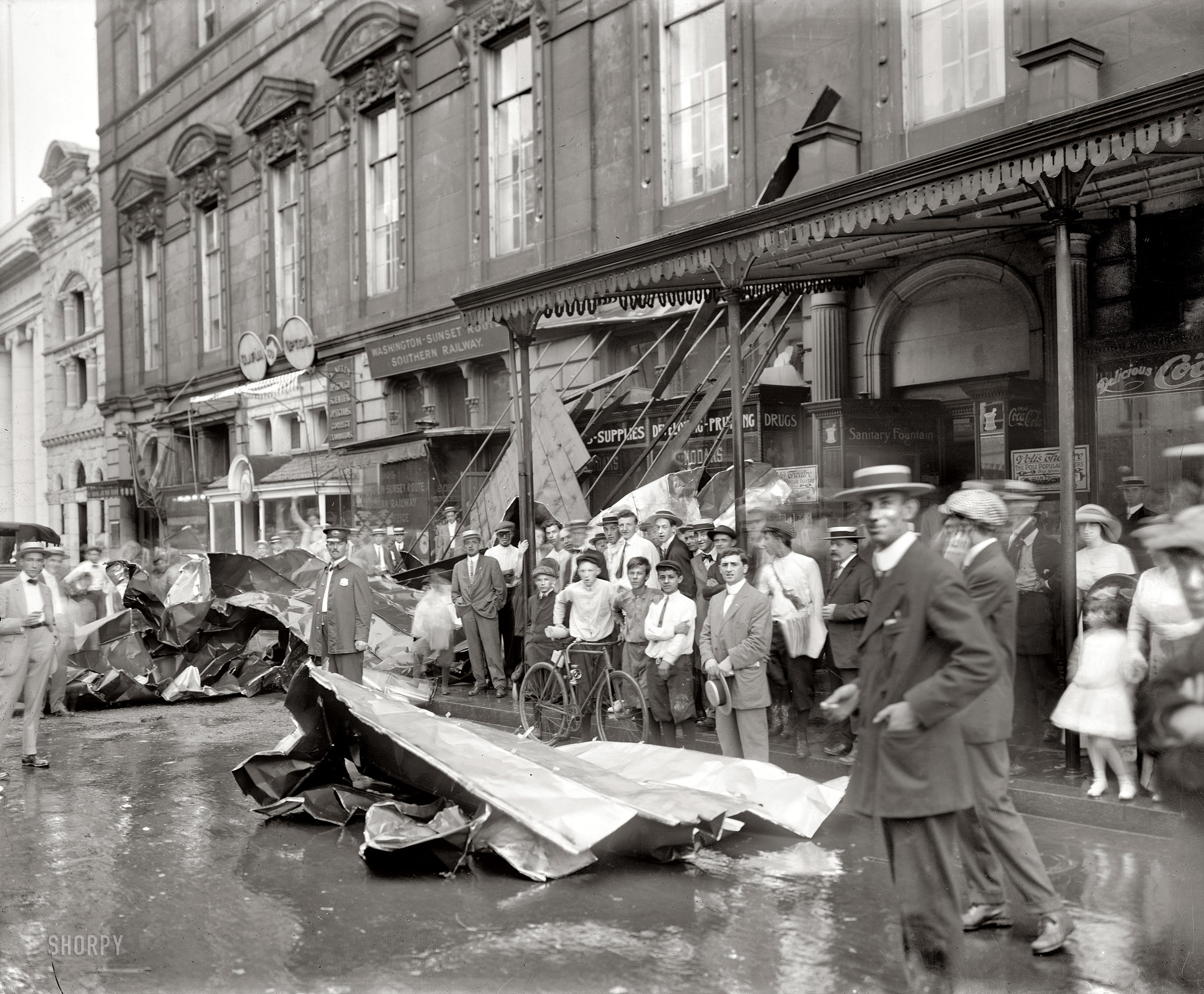 Washington, D.C. "Storm of July 30, 1913." After almost 100 years, these people finally get to be on the Internet. National Photo glass negative. View full size.