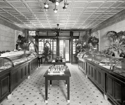 Washington, D.C., circa 1924. "Brownley interior." Our second peek inside the Brownley Confectionery on G Street. On the table: more "Sport Fudge."  National Photo Company Collection glass negative. View full size.