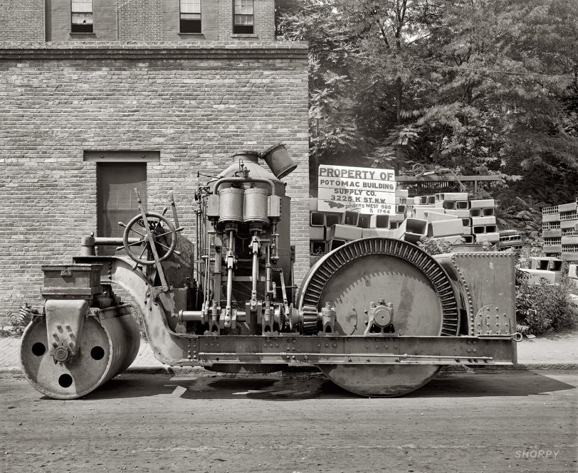 "Crawford Paving Co." Another look at that Barber steamroller circa 1925 in D.C. Watch your fingers, kids. National Photo glass negative. View full size.
