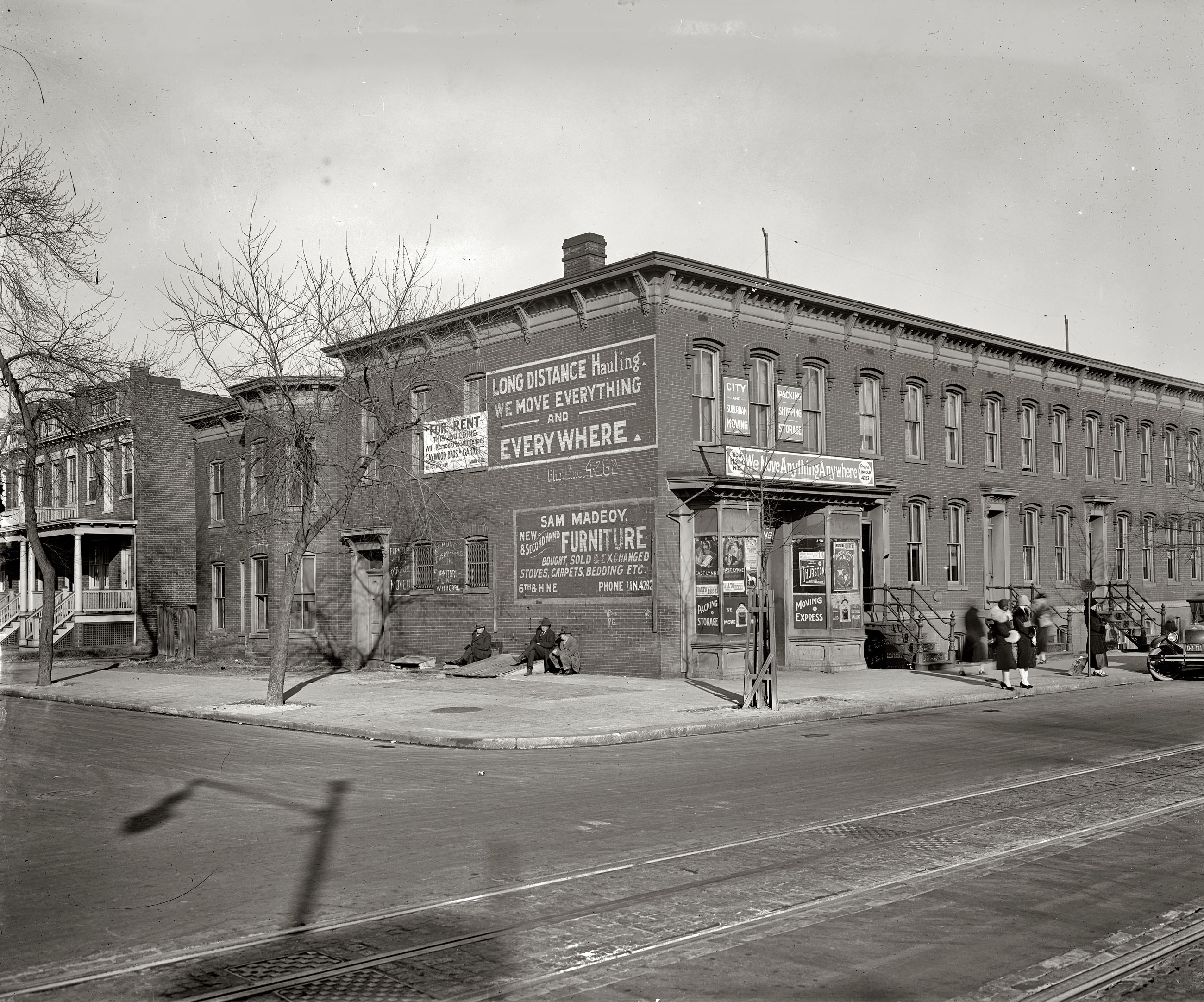 "Rowhouses and moving company." Circa 1925, the furniture and hauling business of Sam Madeoy at 600 H Street N.E. National Photo Company. View full size.