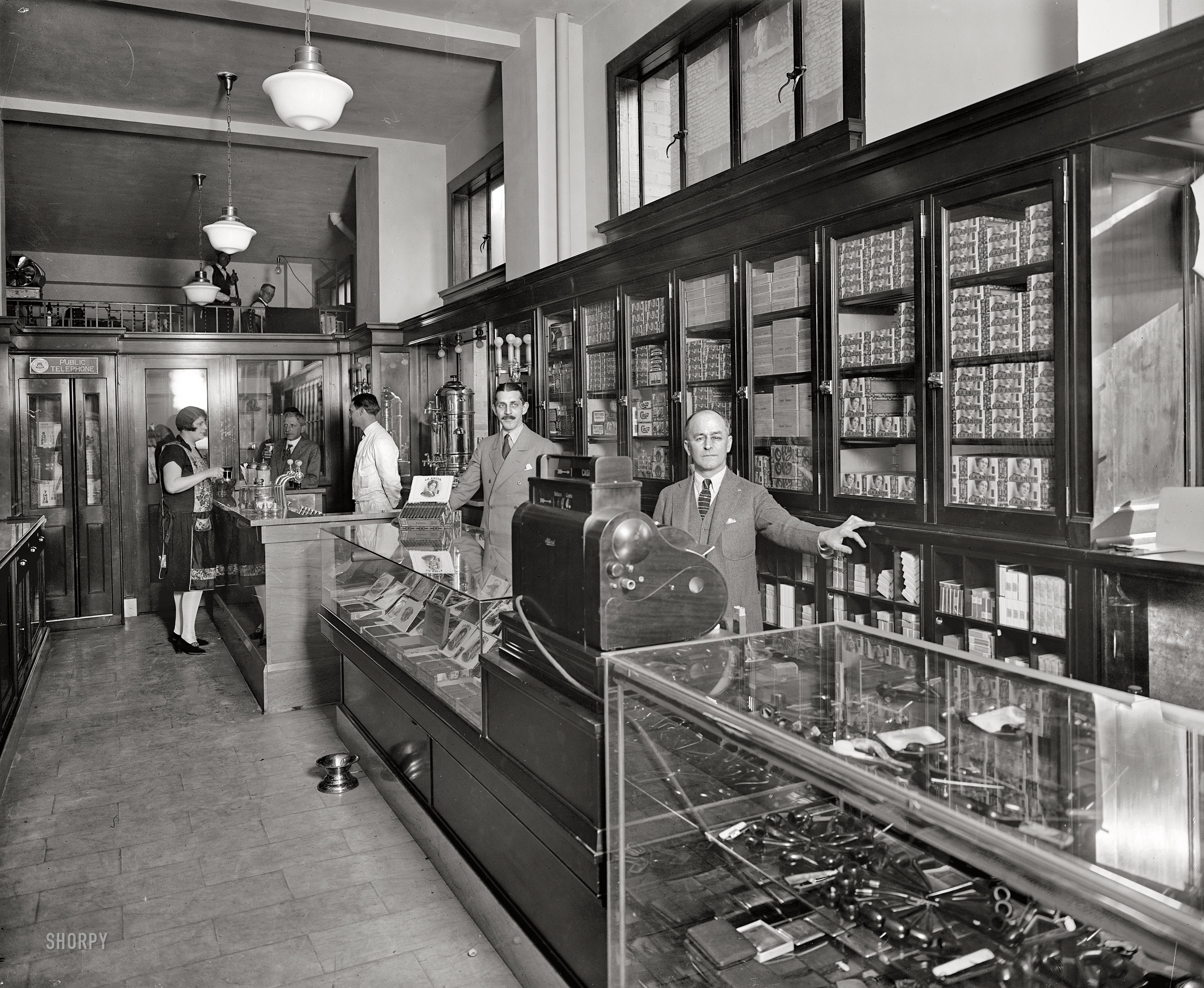 1926. Another view of the Offterdinger cigar store and soda fountain in Washington, D.C. National Photo Co. Collection glass negative. View full size.