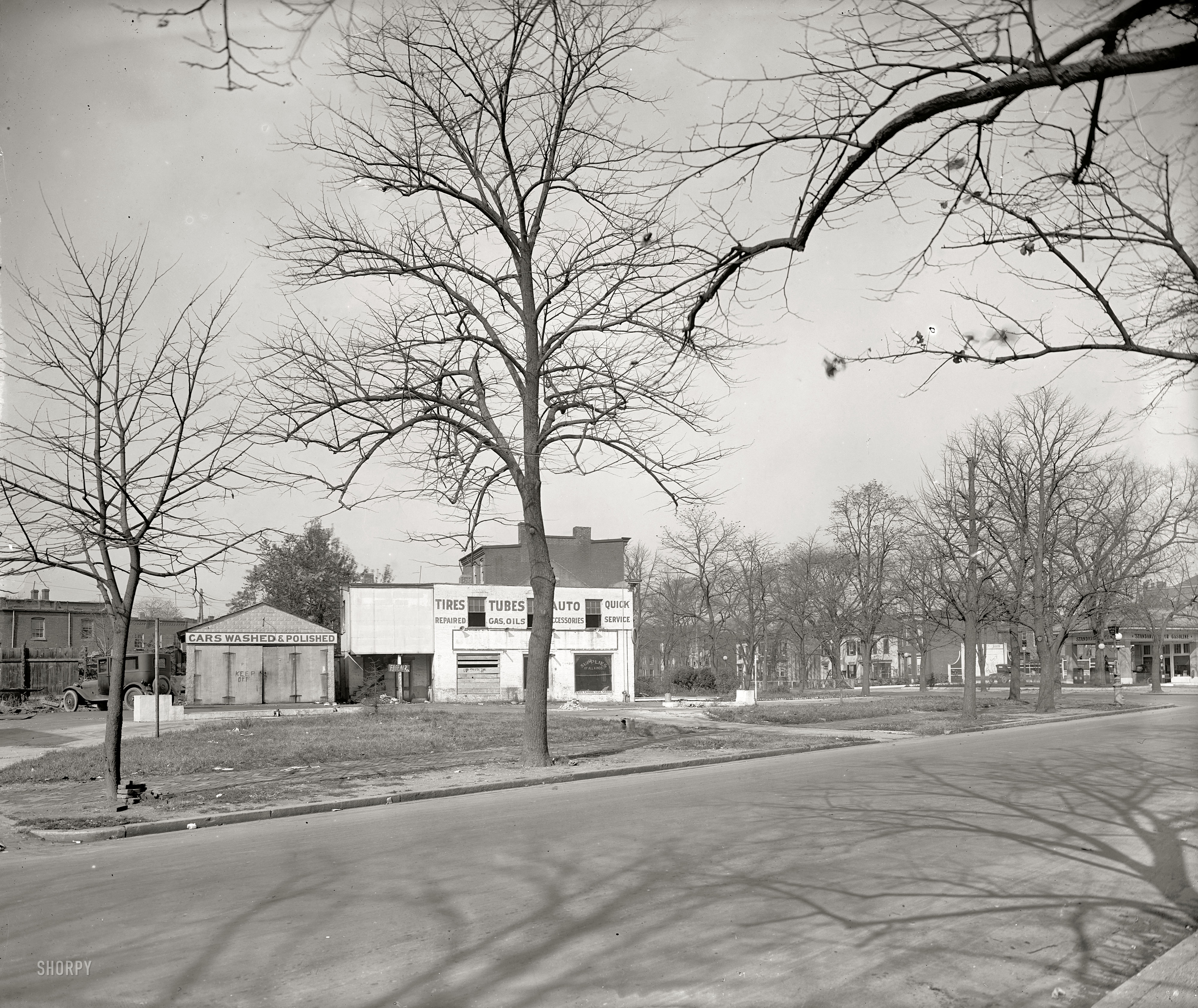Washington, D.C., circa 1925. "Texas Co." Another view of the derelict service station at Mass Ave and 2nd Street N.W. National Photo Co. View full size.