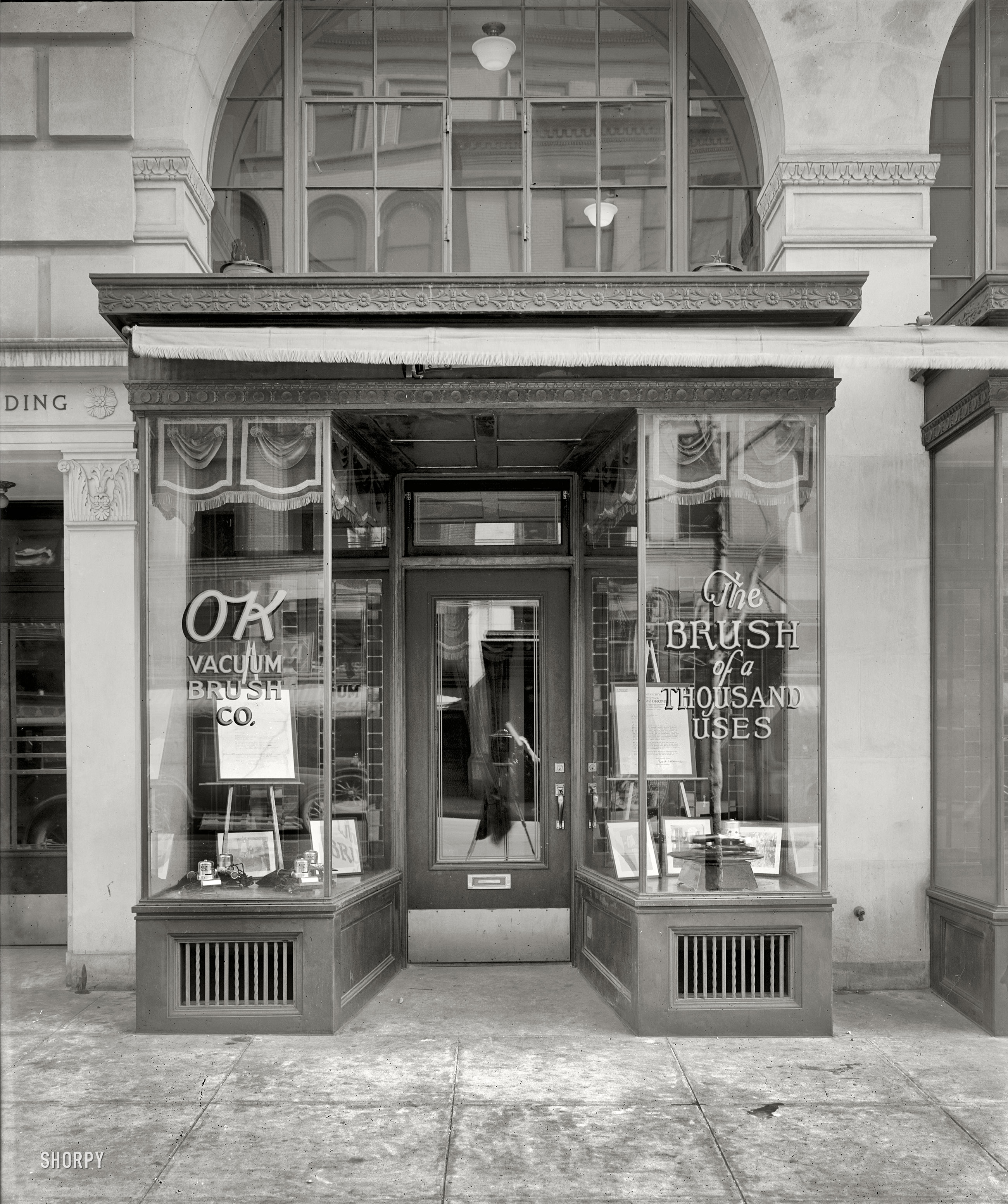 Washington, D.C., circa 1925. "OK Brush Co., exterior." When constrained cleaning budgets preclude the purchase of the best in bristles, consider settling for an OK Vacuum Brush. National Photo Company glass negative. View full size.