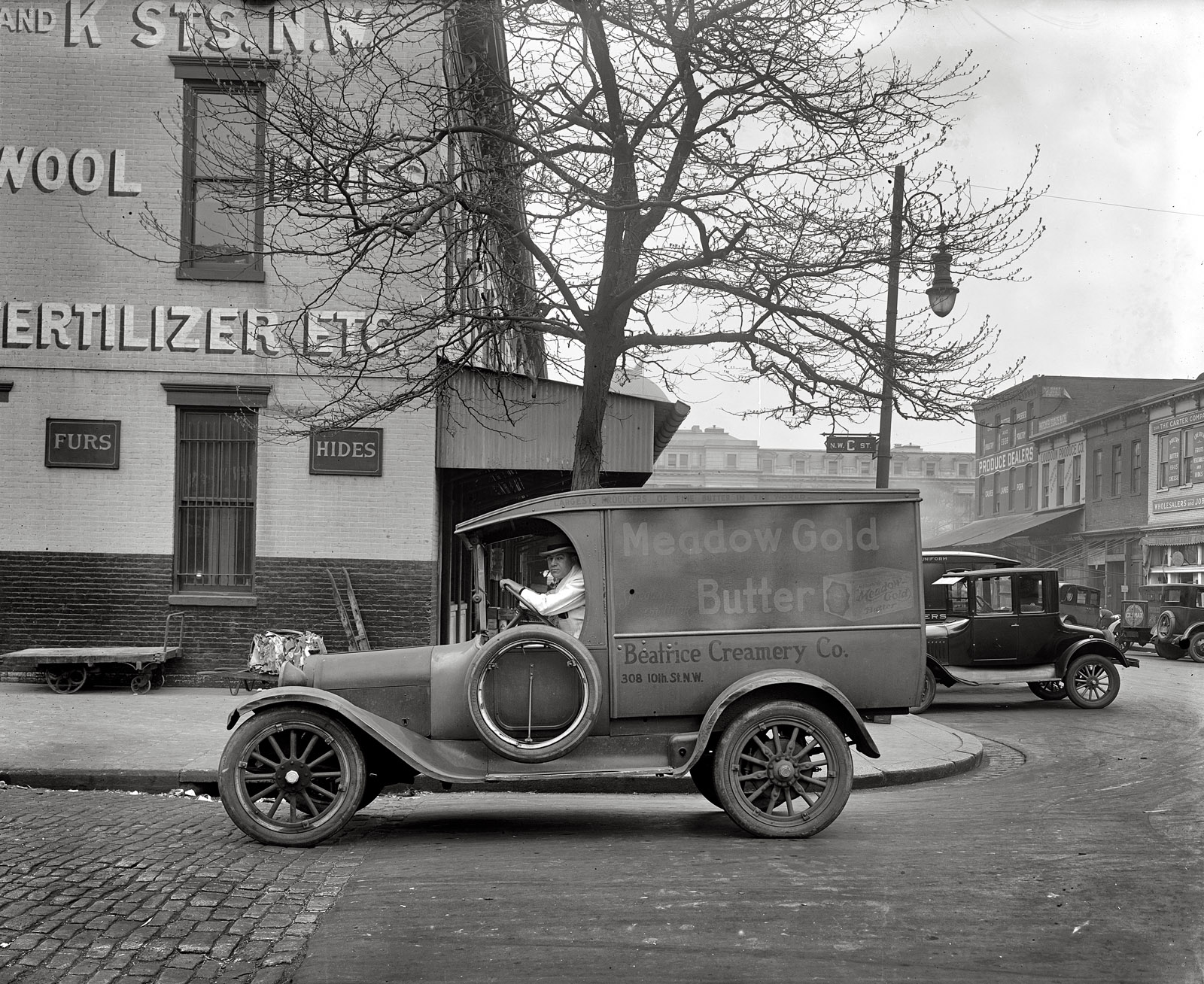 Washington, D.C. "Semmes Motor Co. Meadow Gold Butter truck, 1926." C Street N.W. at 10th. (And running in front of the building at the back was something called "Little B Street.") National Photo Company glass negative. View full size.
