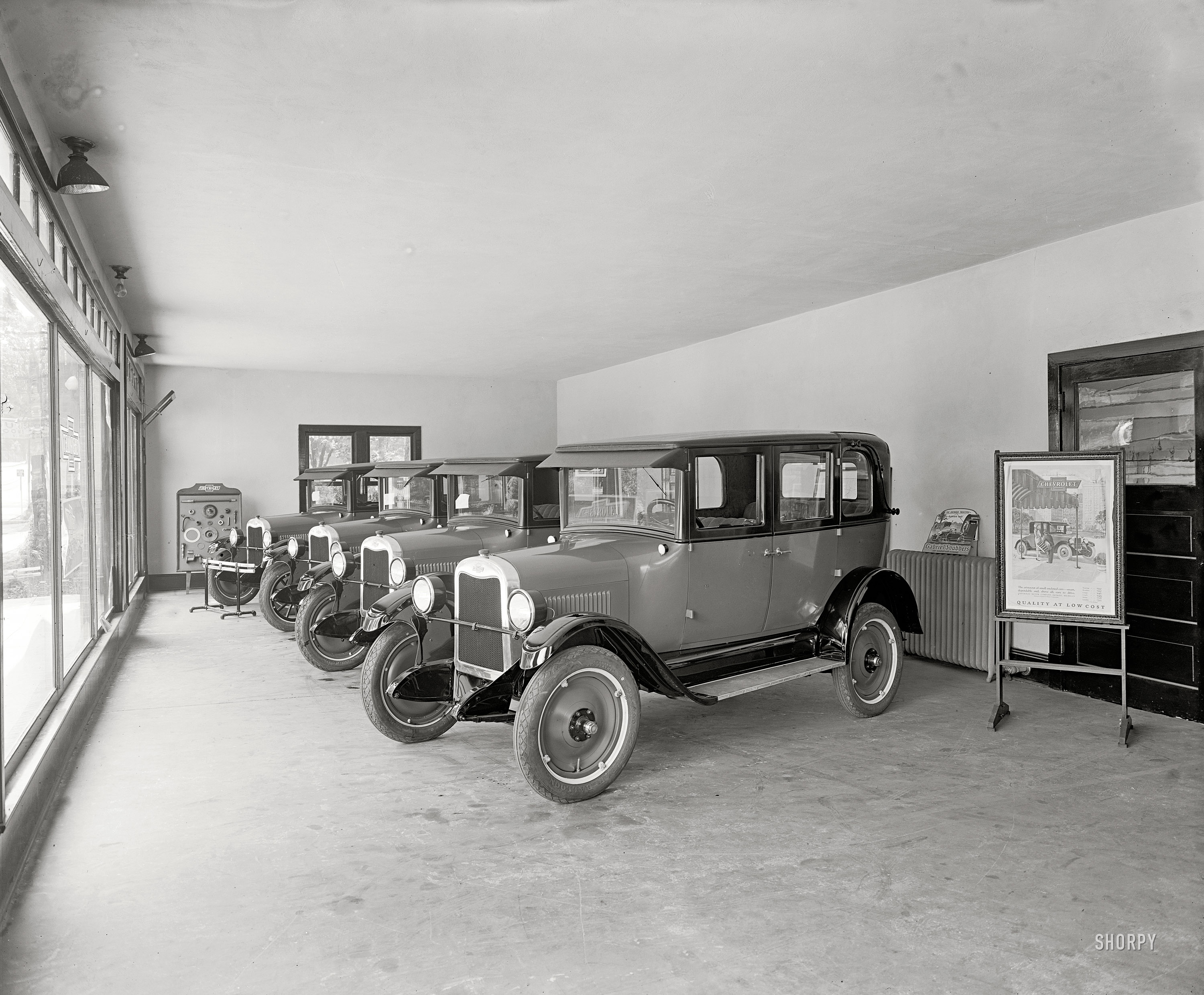 Rockville, Maryland, circa 1926. "Montgomery County Motor Co." Headquarters for "quality at low cost."  National Photo Co. glass negative. View full size.