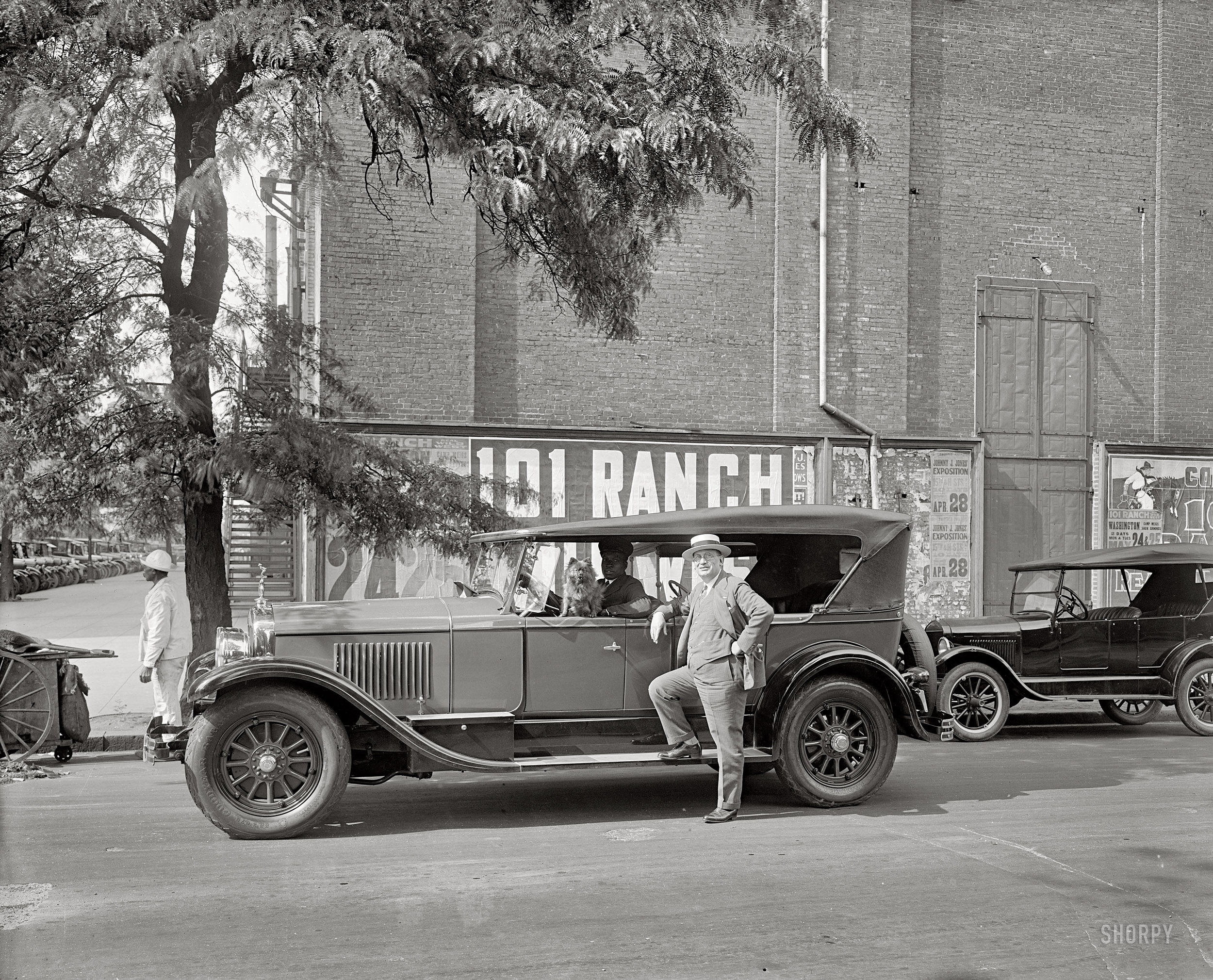 Washington, D.C., circa 1926. "Washington Cadillac Co." A fancy touring car doing its best to keep us from finding out about the "101 Ranch Real Wild West" show. National Photo Company Collection glass negative. View full size.