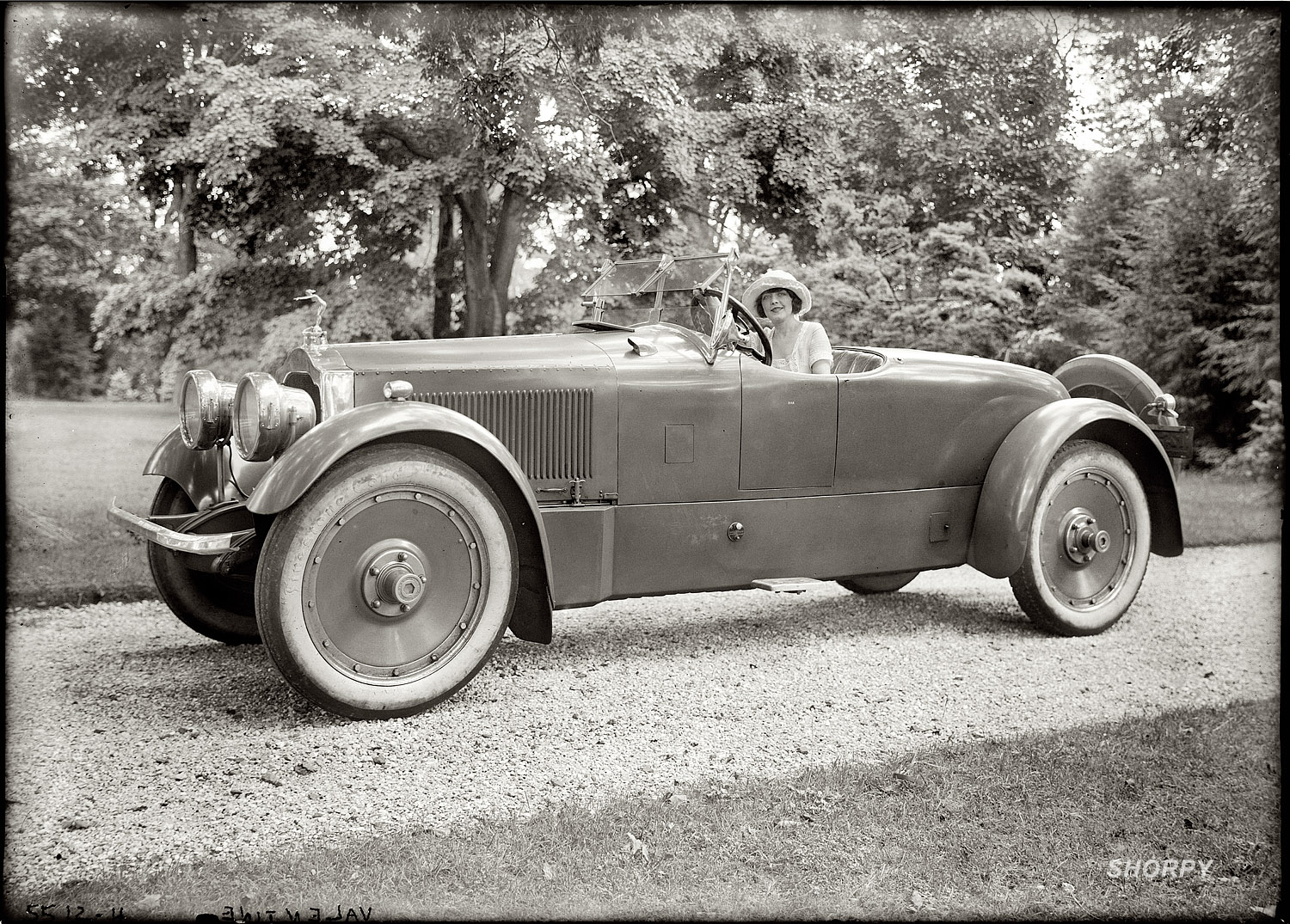 The actress Grace Valentine circa 1920 in an expensive looking Packard roadster. 5x7 glass negative, George Grantham Bain Collection. View full size.