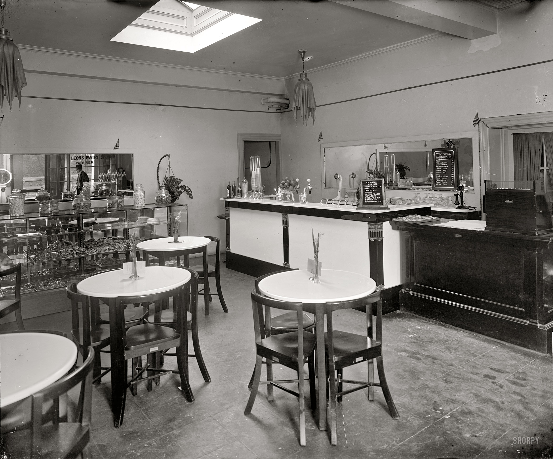 Washington, D.C., circa 1924. "Cathedral Mansions, bakery," 3000 Connecticut Avenue. National Photo Company Collection glass negative. View full size.