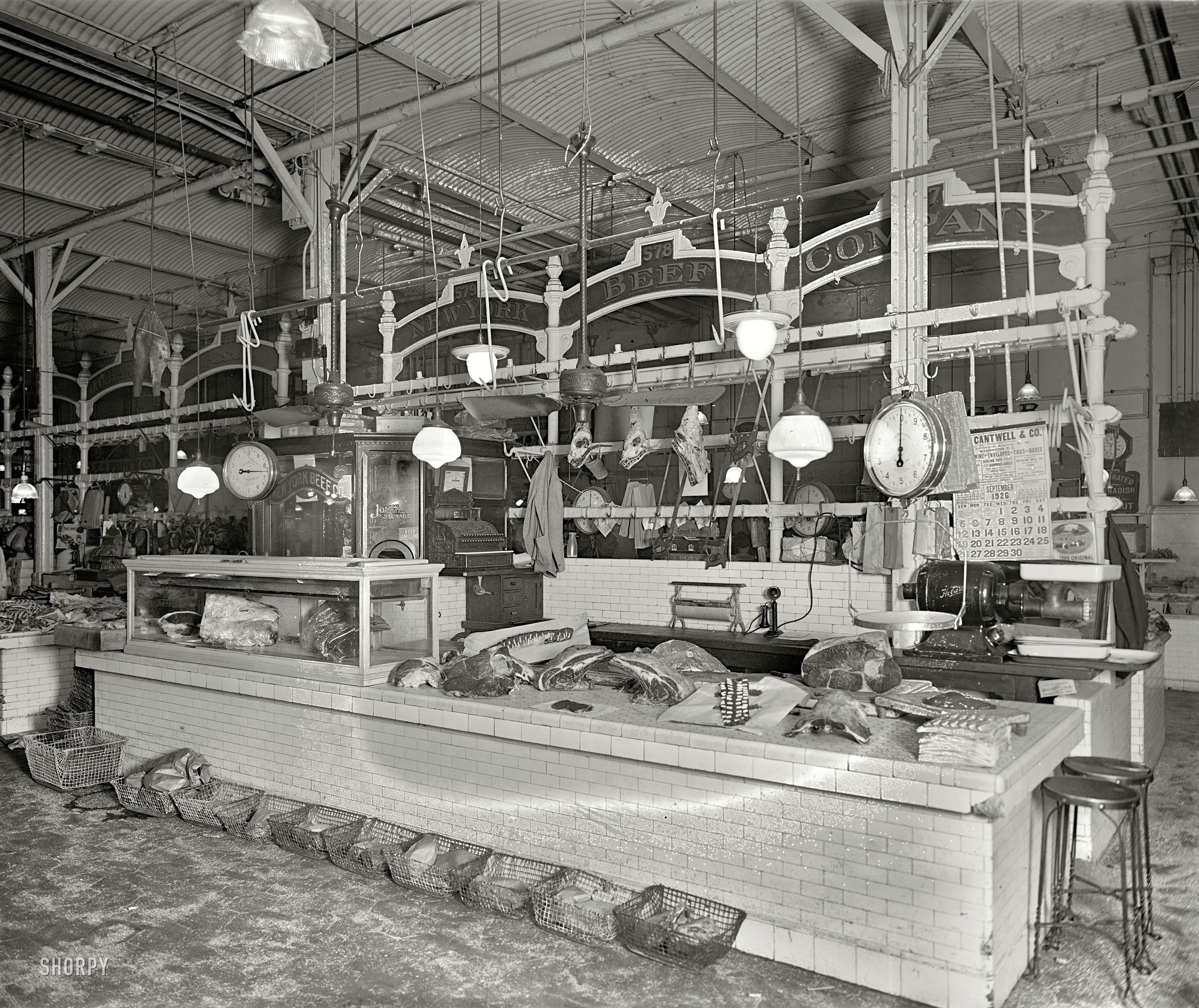 September 1926. Washington, D.C. "Thos. R. Shipp Co. -- C.H. Javins stand." The Charles Javins meat counter, or a neighbor, at Center Market. View full size.