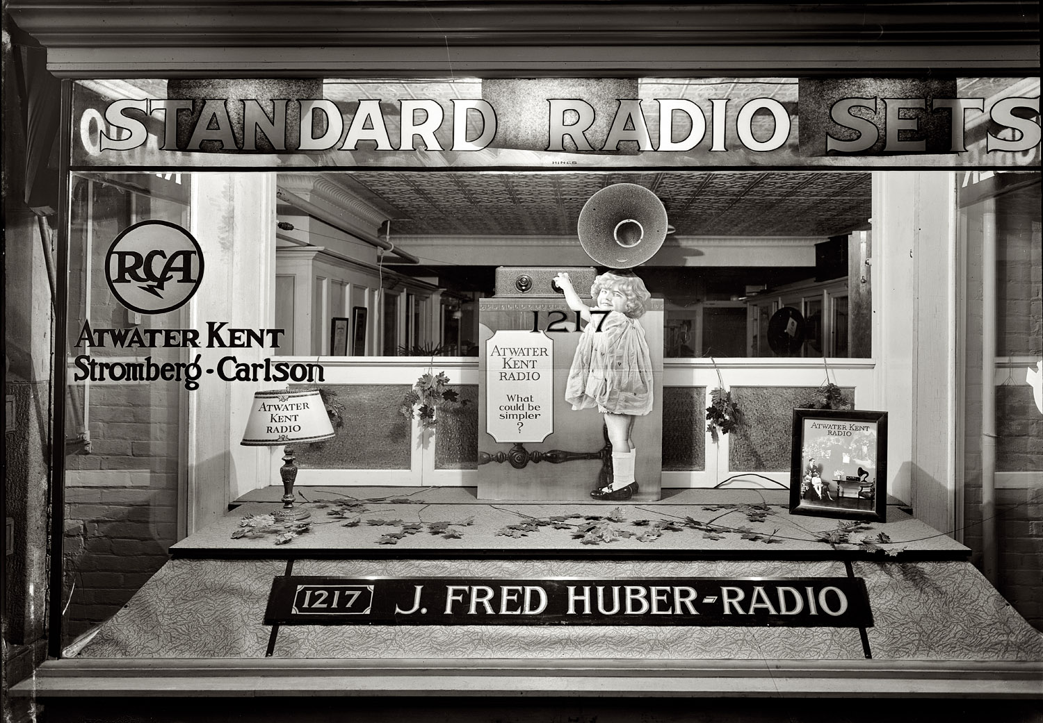 "J. Fred Huber Radio window," 1217 H Street NW in Washington circa 1926. "Phone FRanklin 36." View full size. National Photo Company glass negative.