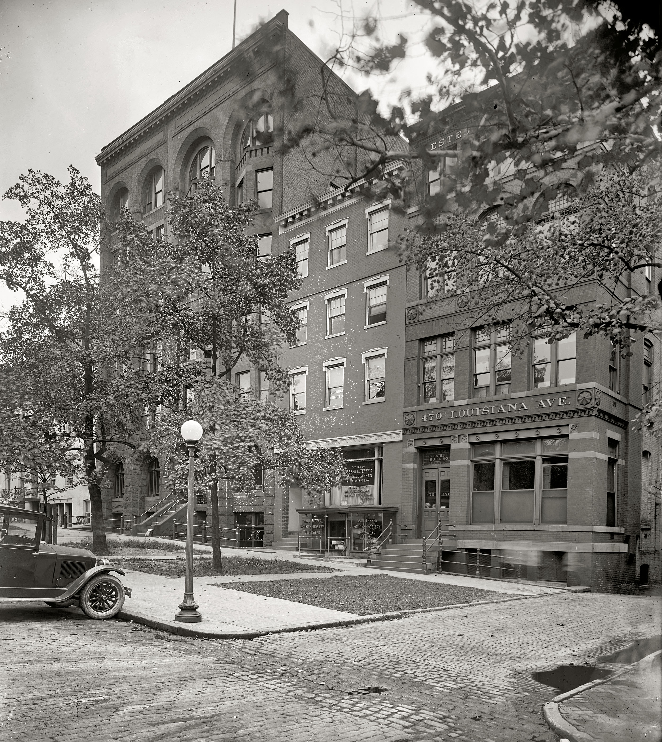 Washington circa 1925. "Tepper Building, Standard Engraving Co., 470 Louisiana Avenue N.W." The Tepper family business is what you might call vertically integrated: Joe's law practice upstairs, above Saul's "Notions, Hosiery, Underwear." National Photo Company Collection glass negative. View full size.