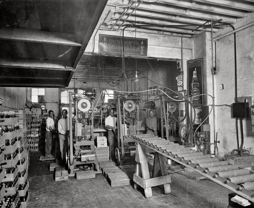 "Whistle Bottling Works." The Washington, D.C., bottling plant for Whistle orange soda circa 1925. National Photo Co. Collection glass negative. View full size.
