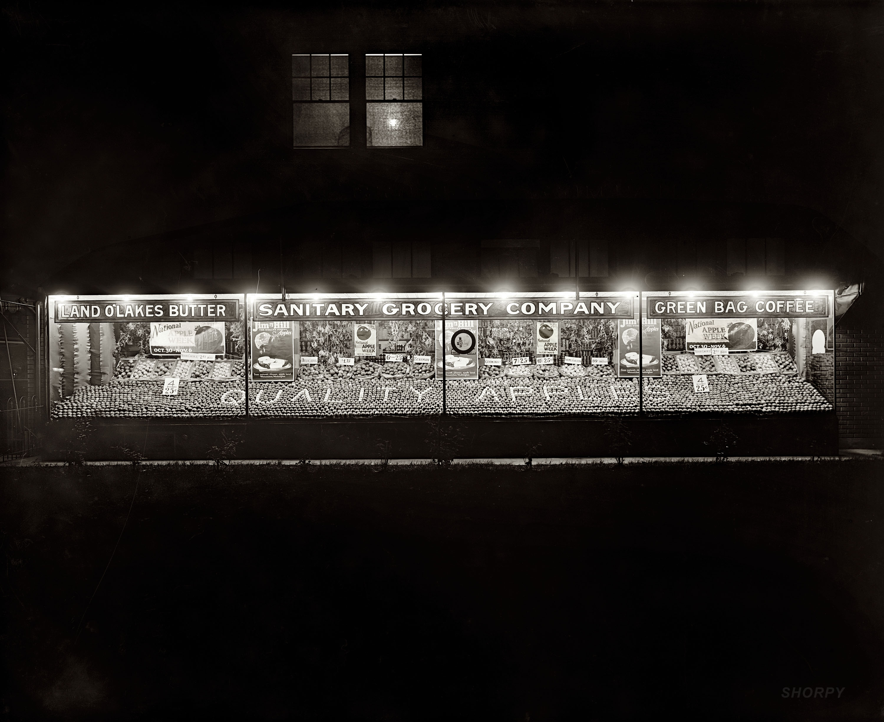 Washington, D.C., 1926. "National Apple Week. Sanitary Grocery." National Photo Company Collection glass negative, Library of Congress. View full size.