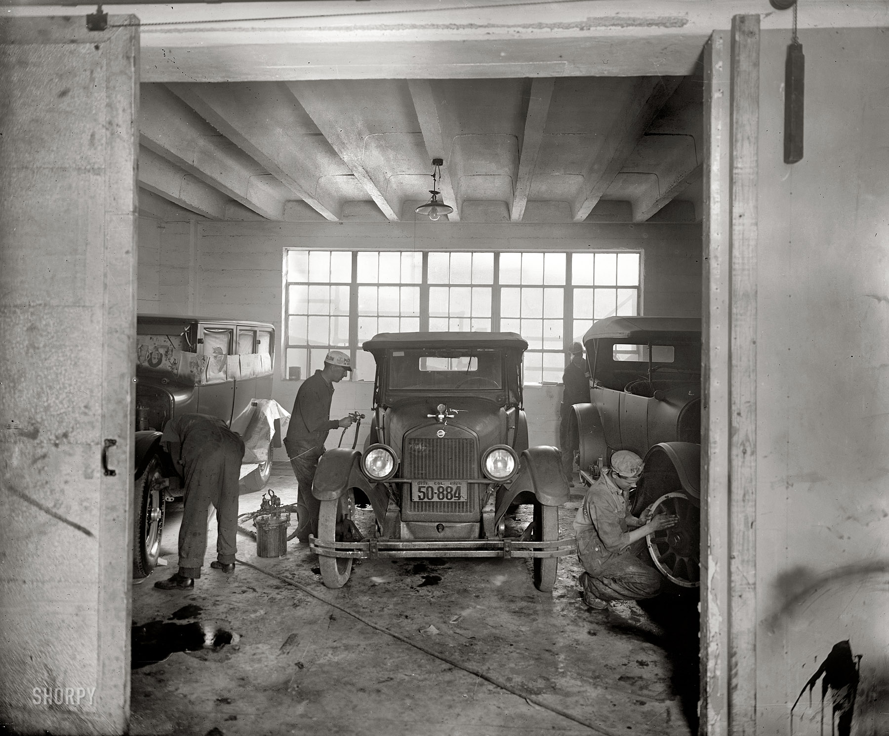 Washington, D.C., circa 1926. "Joseph McReynolds service station." Our third look at this establishment. National Photo glass negative. View full size.