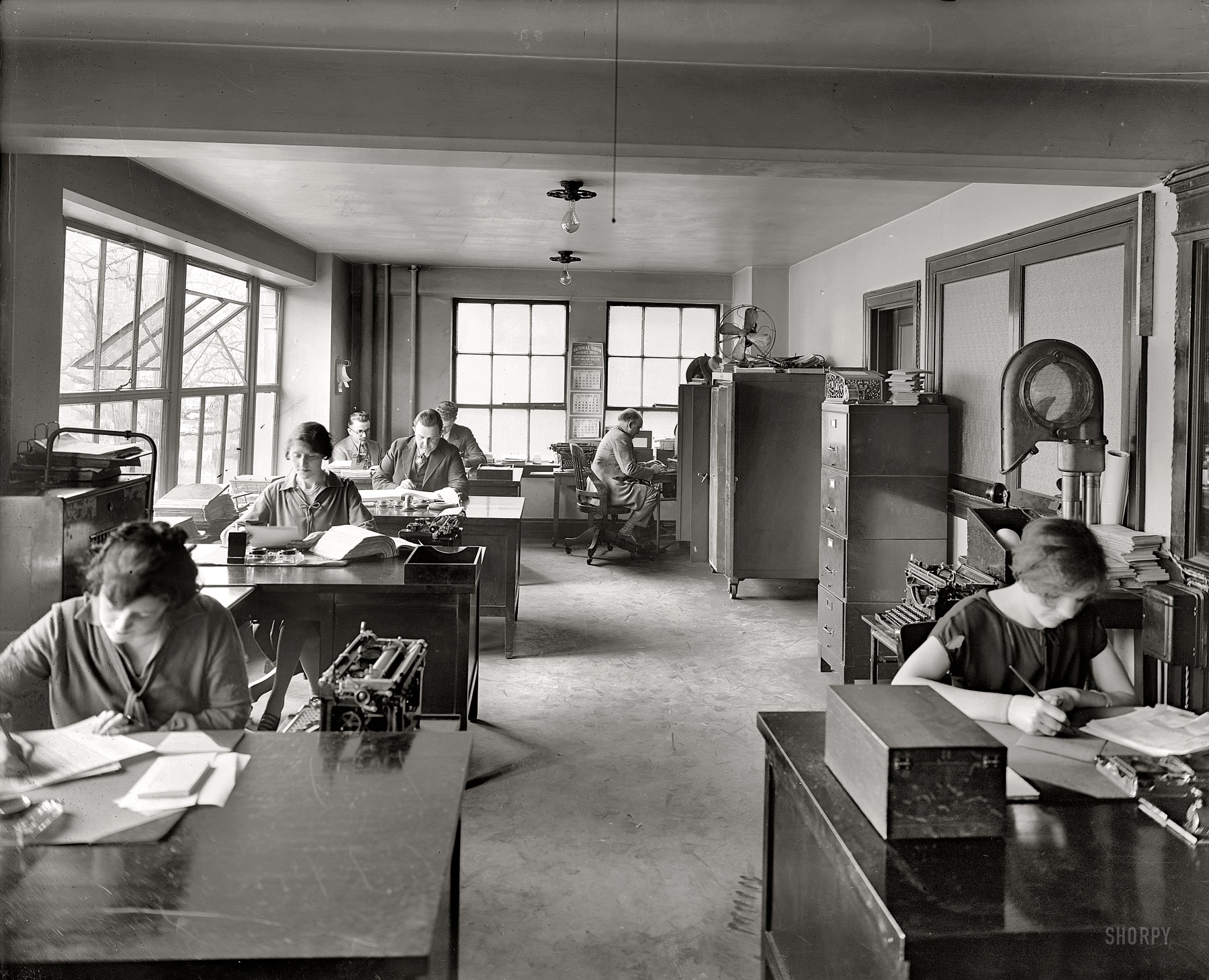 Washington, D.C., 1926. "Joseph McReynolds -- National Publishing Co." Back office at the McReynolds auto parts and sales business. View full size.