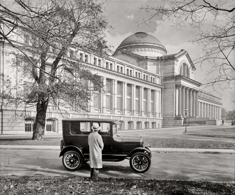 Circa 1926. "Ford car at National Museum." A Model T outside the Smithsonian Institution's main exhibit hall, completed in 1910. Today the building serves as the National Museum of Natural History. National Photo Co. View full size.
